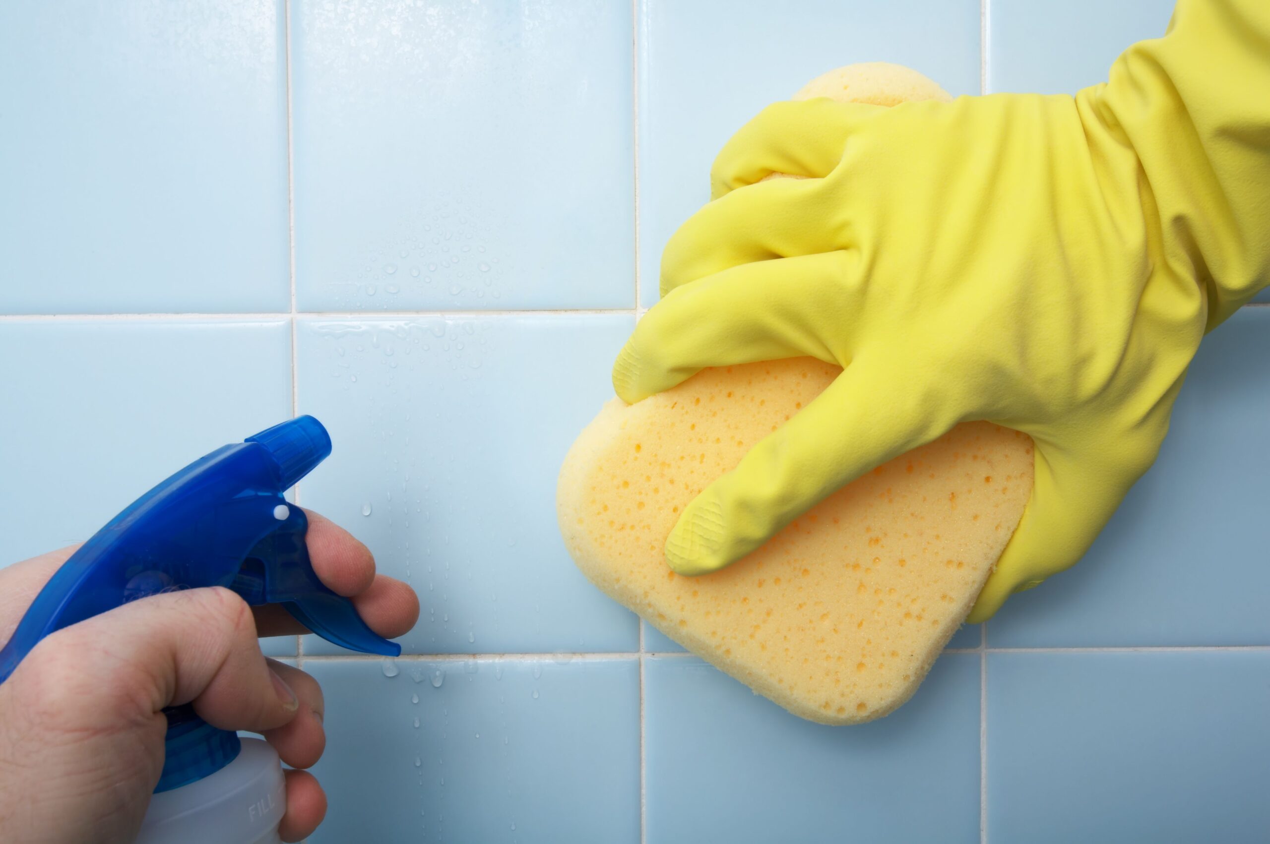 cleaning house scrubbing tile